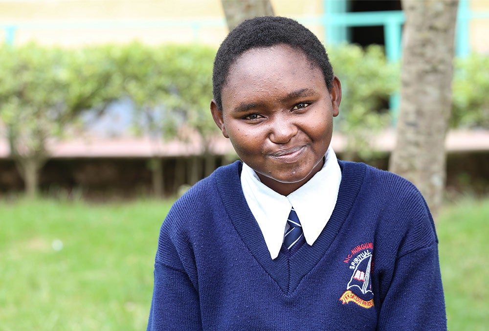 Damaris smiling after cleft surgery