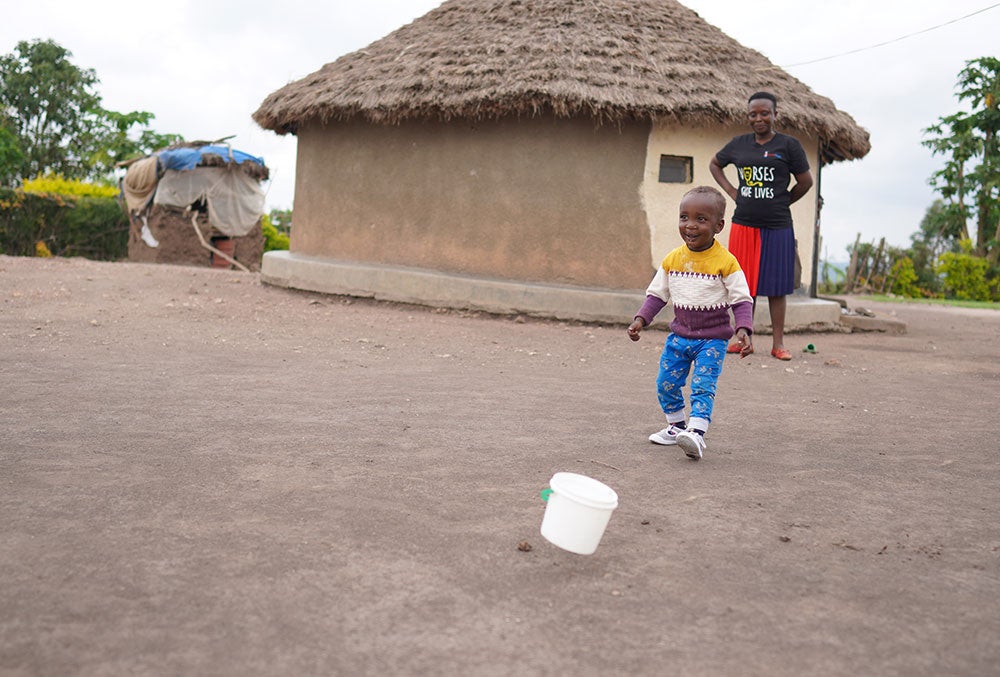 Eric smiling and playing after cleft surgery