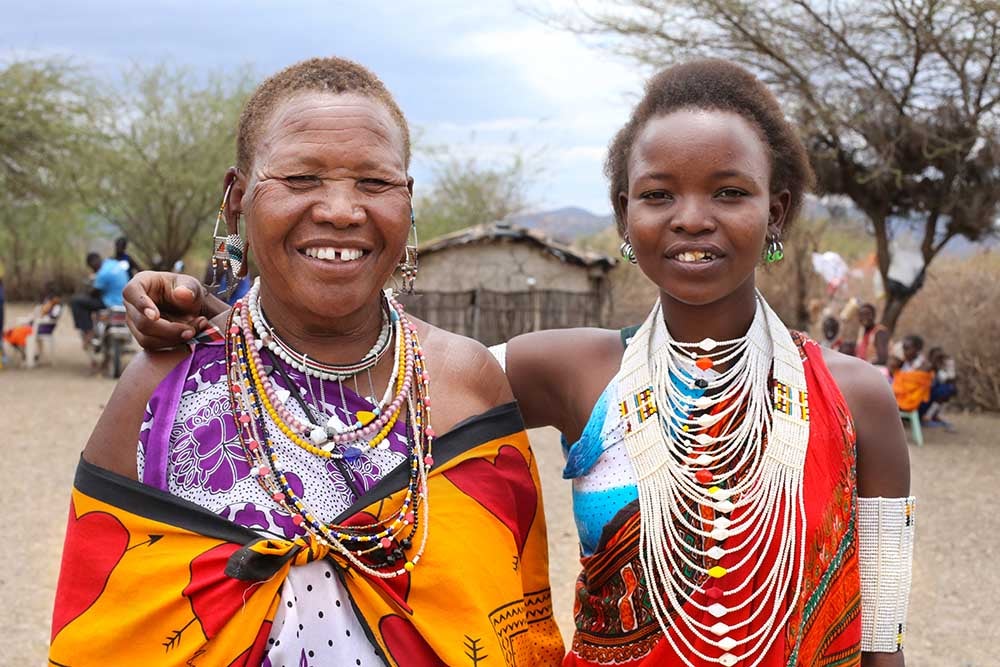 Ndindai smiling with her family after cleft surgery