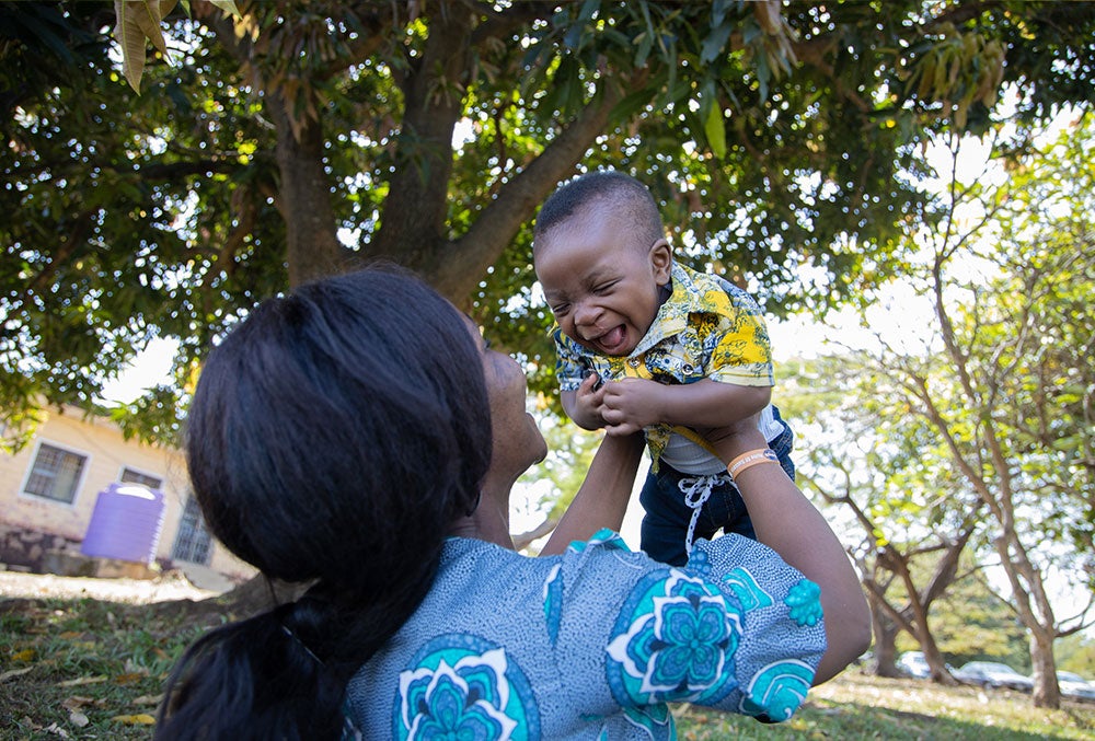 Favour holding Annointed after cleft surgery