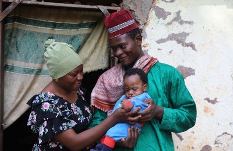 Mouhamed with his family before cleft surgery