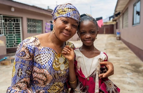 Rawdah smiling with her mother Alimatu after cleft surgery