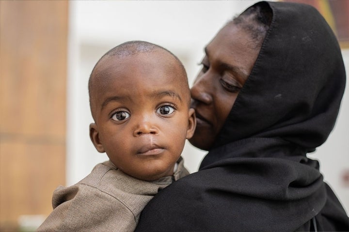 Muaz and his mother after his cleft surgery