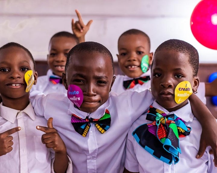 Group of children in choir pose