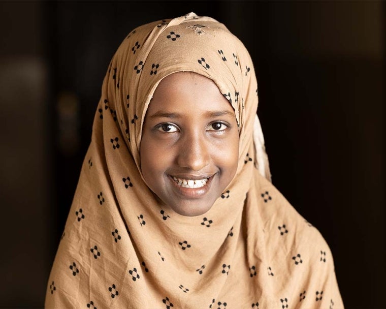 Maryan smiling after cleft surgery